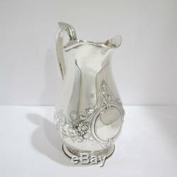 9 3/8 in Coin Silver Schulz & Fischer S. F. Cal. Antique Floral Water Pitcher