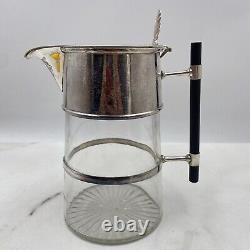 A Christopher Dresser Design Silver-plated Tapering Water Jug