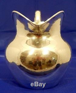 A hand wrought sterling water pitcher, The Kalo Shop, Chicago c. 1940