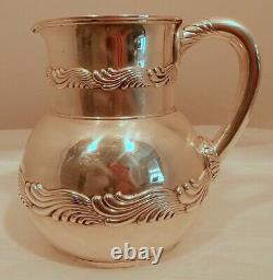 A sterling water pitcher, Wave Edge pattern, by Tiffany & Co, NY c. 1875-91