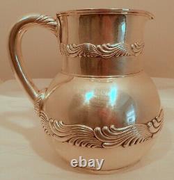 A sterling water pitcher, Wave Edge pattern, by Tiffany & Co, NY c. 1875-91