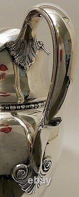 A tall sterling silver water pitcher, Tiffany & Co, New York, c. 1902-7