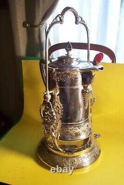 ANTIQUE ORNATE VICTORIAN S/P. MERIDEN 1870's TILTING WATER PITCHER ON STAND, L-F5