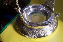 ANTIQUE ORNATE VICTORIAN S/P. MERIDEN 1870's TILTING WATER PITCHER ON STAND, L-F5