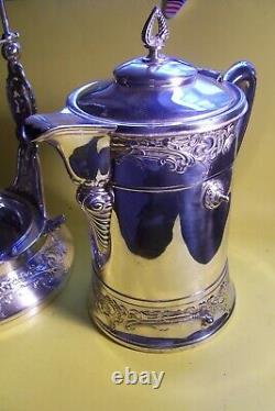 ANTIQUE ORNATE VICTORIAN S/P. MERIDEN 1870's TILTING WATER PITCHER ON STAND, L-F5