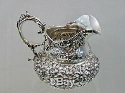 ANTIQUE STERLING SILVER REPOUSSE HAND CHASED WATER PITCHER Dominick & Haff 1897