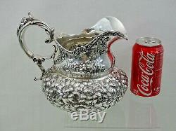 ANTIQUE STERLING SILVER REPOUSSE HAND CHASED WATER PITCHER Dominick & Haff 1897