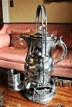 American Victorian SP Tilting Ice Water Pitcher On Frame -Wilcox Silver Plate Co