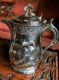 American Victorian SP Tilting Ice Water Pitcher On Frame -Wilcox Silver Plate Co