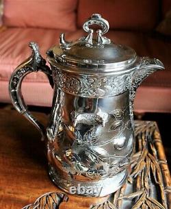 American Victorian SP Tilting Ice Water Pitcher On Frame -Wilcox Silver Plate Co