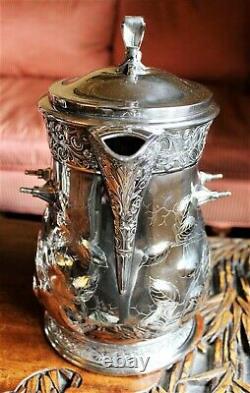 American Victorian SP Tilting Ice Water Pitcher On Frame -Wilcox Silver Plate Co