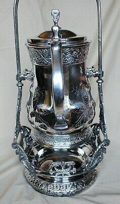 American Victorian SP Tilting Ice Water Pitcher On Frame -Wilcox Silver Plate Co