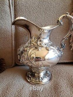 Antique sterling silver water pitcher