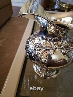 Antique sterling silver water pitcher