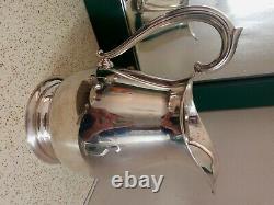 Antique sterling silver water pitcher
