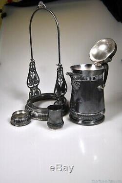 C. 1889 No. 0403 TILTING PITCHER WATER SET by Meridian Silver Plate Co