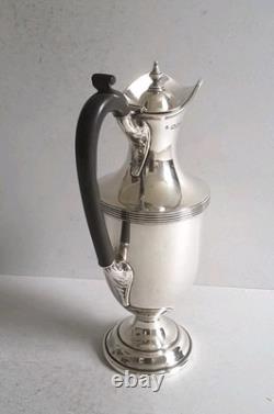 ELEGANT, ANTIQUE SOLID SILVER WATER / WINE JUG. 540gms. HT. 26.8cms. LON. 1919