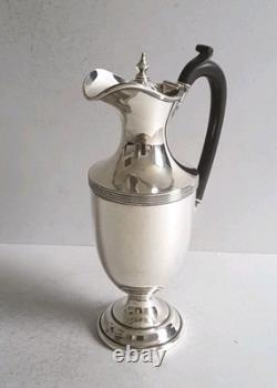 ELEGANT, ANTIQUE SOLID SILVER WATER / WINE JUG. 540gms. HT. 26.8cms. LON. 1919