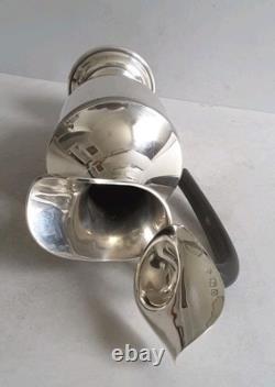 ELEGANT, ANTIQUE SOLID SILVER WATER / WINE JUG. 540gms. HT. 26.8cms. LON. 1919