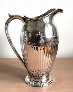 Elegant large Victorian silver water jug. London 1882. Aldwinkle & Slater