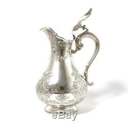 Fabulous Sterling Silver Water Pitcher (jug) with a lid. England year 1889