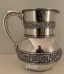 Fine Tiffany Sterling Hand Chased Rinceaux Bordered Water Pitcher C. 1885