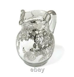 Glass water pitcher (jug). Silver floral overlay on clear glass. USA
