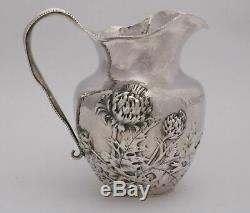 International Sterling Silver Hammered Water Pitcher Thistle Repousse c1900