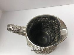 Kirk Repousse sterling silver water pitcher. 27 troy ounces. 1880-1890