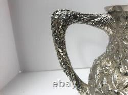 Kirk Repousse sterling silver water pitcher. 27 troy ounces. 1880-1890