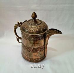 Large Kashmiri tinned copper lidded water ewer, pitcher, jug with foliate detail