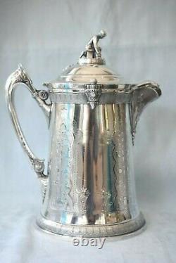 Massive Antique Reed & Barton Iced Water Ice Skating Boy Silver Plate Pitcher