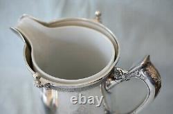 Massive Antique Reed & Barton Iced Water Ice Skating Boy Silver Plate Pitcher