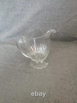 Pitcher water jug in molded cut glass with facets