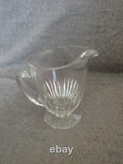Pitcher water jug in molded cut glass with facets