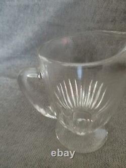 Pitcher water jug in molded cut glass with facets