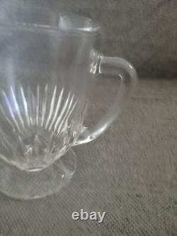 Pitcher water jug in molded cut glass with facets