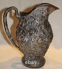 Sterling Repousse Water Pitcher By F. Bucher & Sons In The Early 20th Century