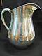 Sterling Silver Arts And Crafts Water Pitcher By Lewy Bros. Hand Hammered