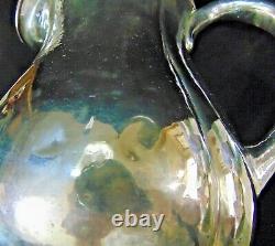 Sterling Silver Arts and Crafts Water Pitcher by Lewy Bros. Hand Hammered