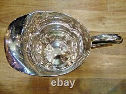 Sterling Silver Arts and Crafts Water Pitcher by Lewy Bros. Hand Hammered