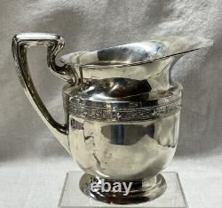 Sterling Water Pitcher by M H F Decorated Shoulder No Monogram