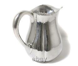 Sterling silver water pitcher (jug). Arts and Crafts. USA, Lewy Bros. Co