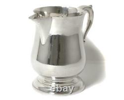 Sterling silver water pitcher (jug). USA, workshop Poole Silver Company
