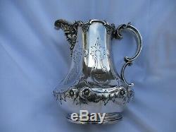 TIFFANY ANTIQUE STERLING WATER PITCHER, CIRCA 1850 s