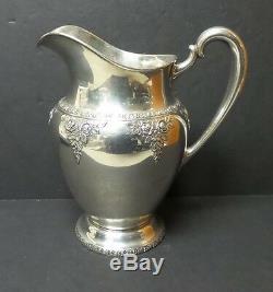 VINTAGE WALLACE NORMANDIE STERLING SILVER WATER PITCHER, 730 grams