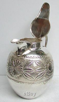 Vintage Peruvian Crafted Silver Water Pitcher