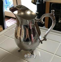 WM Rogers Silver plated water pitcher Footed Stand Vintage and ice guard 817