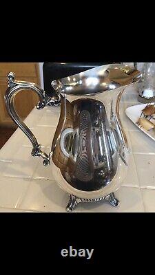 WM Rogers Silver plated water pitcher Footed Stand Vintage and ice guard 817