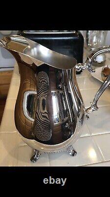 WM Rogers Silver plated water pitcher Footed Stand Vintage and ice guard 817